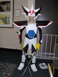 It’s a Gundum. Just kidding, she is the white armor from Ronin Warriors.