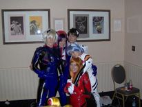 Plugsuit Evas. Two of these characters kissed, neither was female.